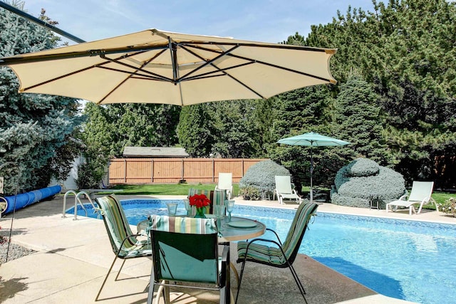 3114 Rd 103, Pasco, WA 99301 - view of pool featuring a fenced in pool, a patio area, fence, and outdoor dining space