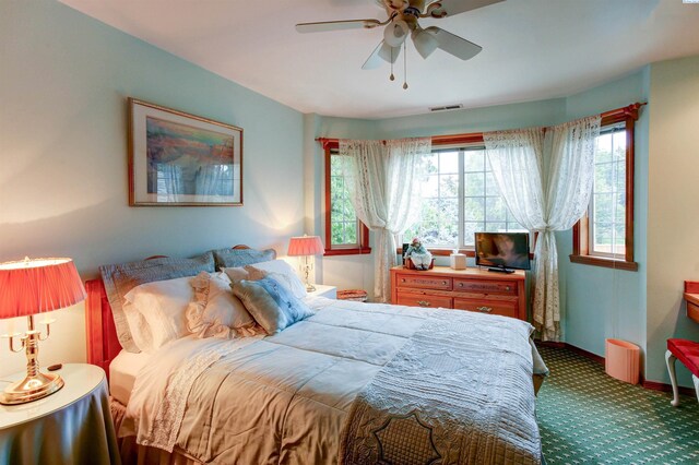 3114 Rd 103, Pasco, WA 99301 - bedroom featuring carpet, visible vents, baseboards, and a ceiling fan