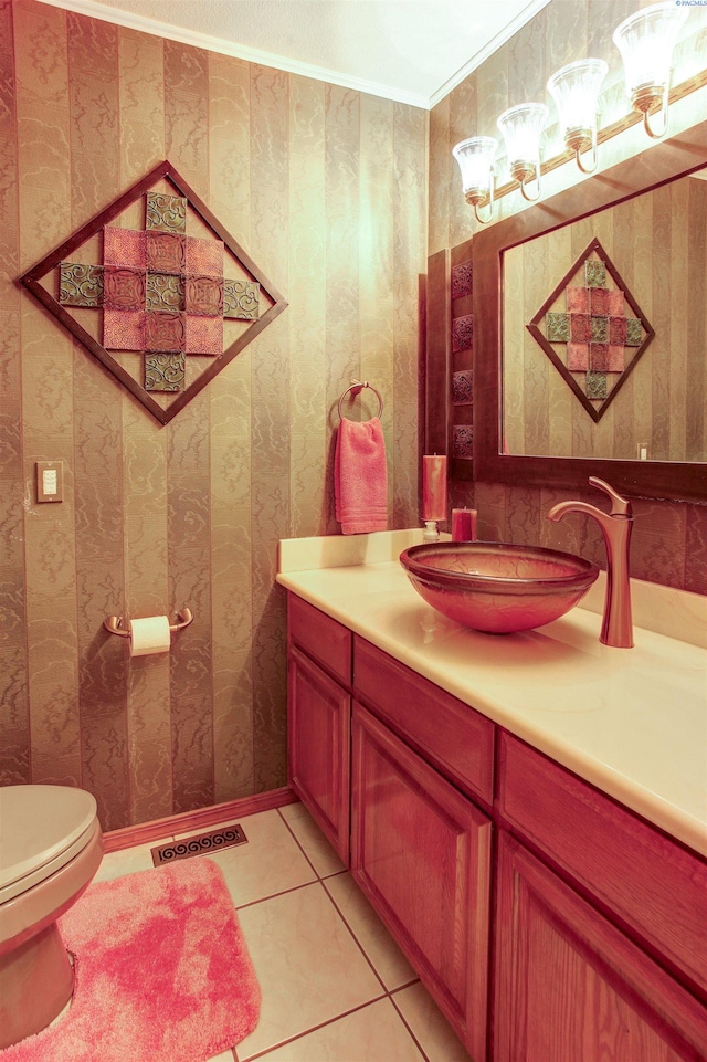 3114 Rd 103, Pasco, WA 99301 - half bath with vanity, visible vents, toilet, tile patterned floors, and wallpapered walls