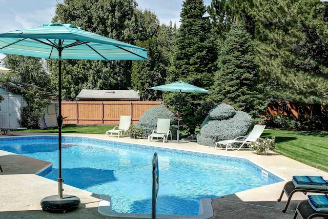 3114 Rd 103, Pasco, WA 99301 - view of pool with a yard, a patio area, a fenced in pool, and fence