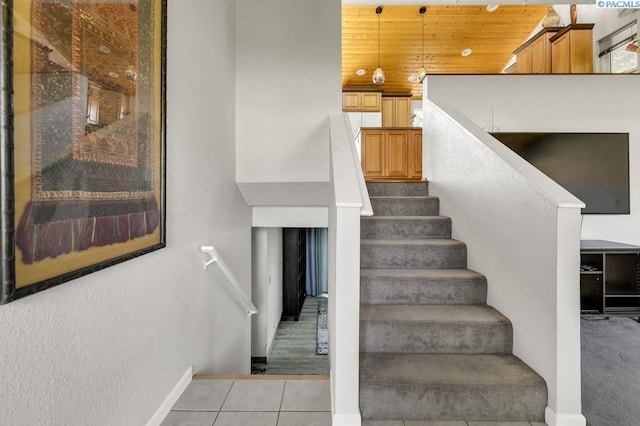 141 Travis Ln, Kennewick, WA 99338 - stairway with baseboards and tile patterned floors
