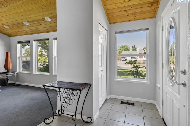 141 Travis Ln, Kennewick, WA 99338 - doorway featuring wood ceiling, vaulted ceiling, and light tile patterned floors