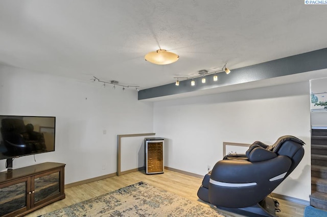 141 Travis Ln, Kennewick, WA 99338 - living area with rail lighting and wood finished floors