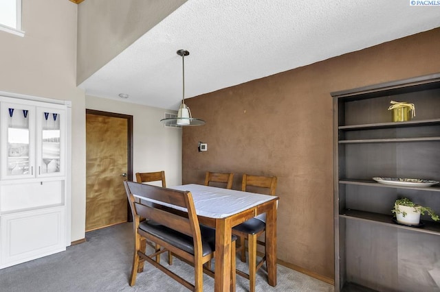 141 Travis Ln, Kennewick, WA 99338 - carpeted dining area with a textured ceiling