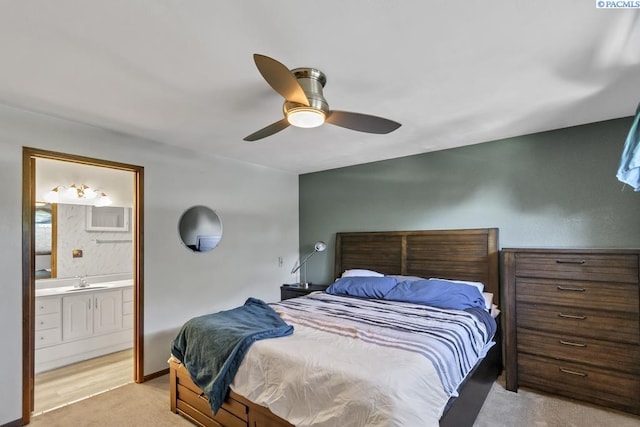 141 Travis Ln, Kennewick, WA 99338 - bedroom featuring light carpet, connected bathroom, and ceiling fan