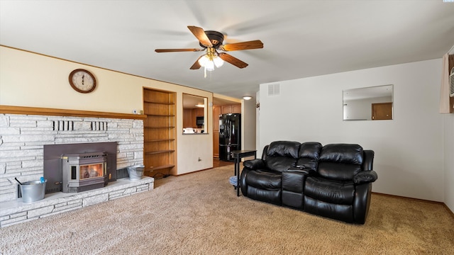 1707 W 19th Ave, Kennewick, WA 99337 - living area with a ceiling fan, carpet floors, and built in shelves