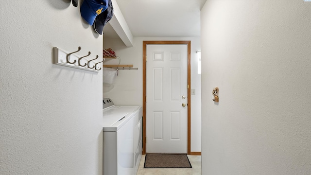 1707 W 19th Ave, Kennewick, WA 99337 - laundry room featuring separate washer and dryer and a textured wall