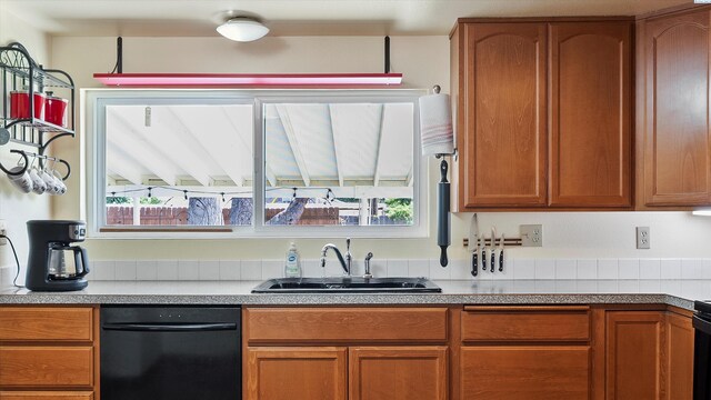 1707 W 19th Ave, Kennewick, WA 99337 - kitchen featuring dishwasher, brown cabinetry, and light countertops