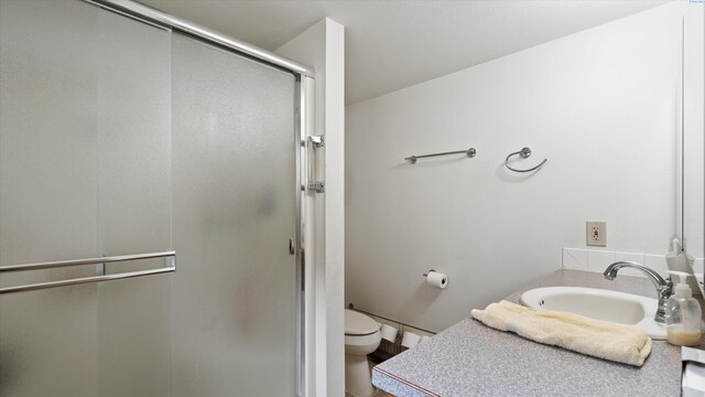 1707 W 19th Ave, Kennewick, WA 99337 - bathroom with vanity and a shower stall