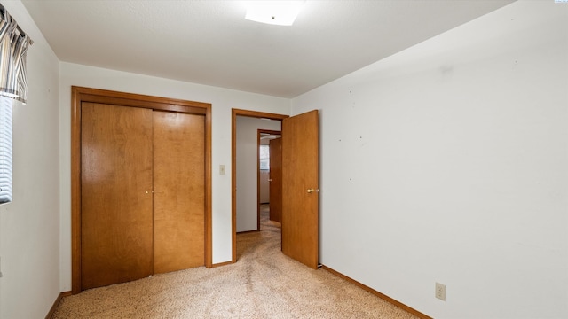 1707 W 19th Ave, Kennewick, WA 99337 - unfurnished bedroom featuring light carpet and a closet