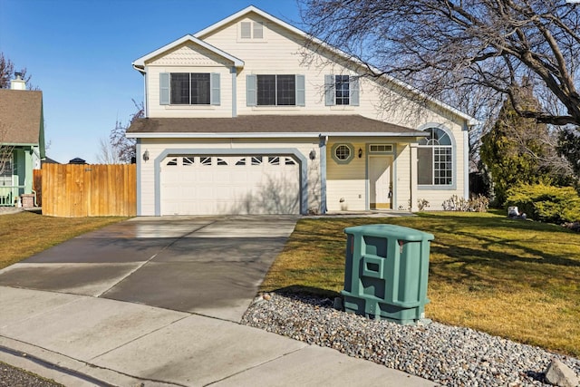 traditional-style home with a garage, concrete driveway, a front yard, and fence