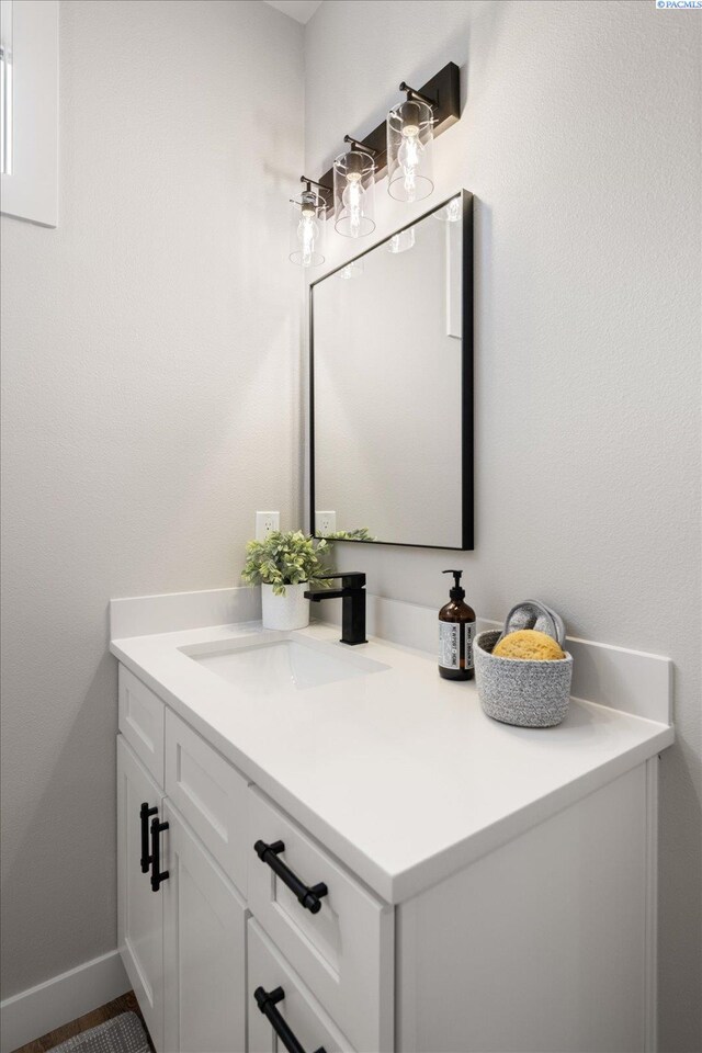 7139 W 35th Ave, Kennewick, WA 99338 - bathroom with vanity and baseboards