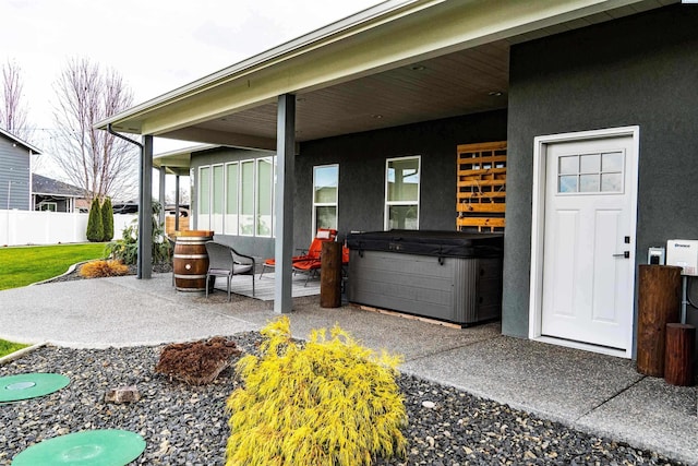 view of patio featuring a hot tub