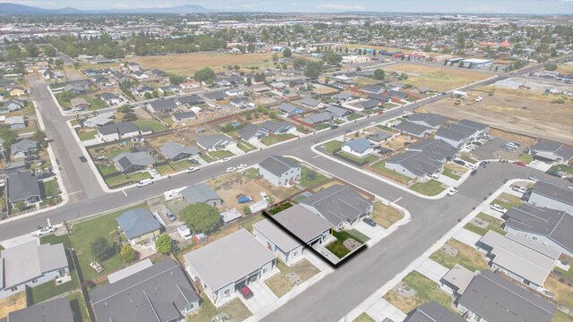 412 Whitefish Ln, Pasco, WA 99301 - aerial view of property and surrounding area with nearby suburban area and mountains