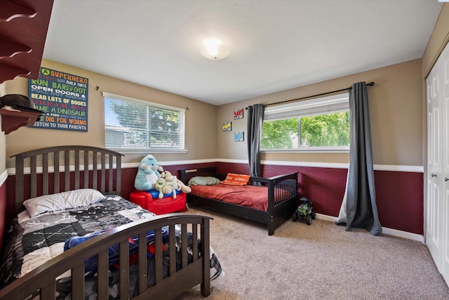 3321 W 24th Ave, Kennewick, WA 99337 - bedroom featuring carpet floors, a closet, and baseboards
