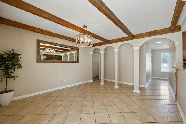 3321 W 24th Ave, Kennewick, WA 99337 - empty room with light tile patterned floors, beam ceiling, a chandelier, and baseboards