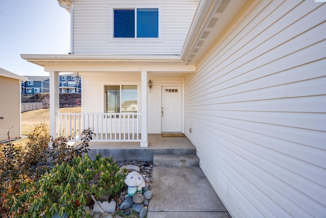 entrance to property with a porch