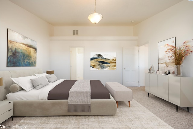 carpeted bedroom with visible vents