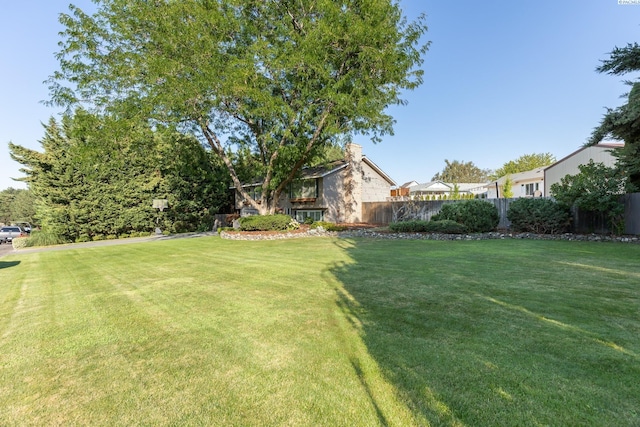 view of yard with fence