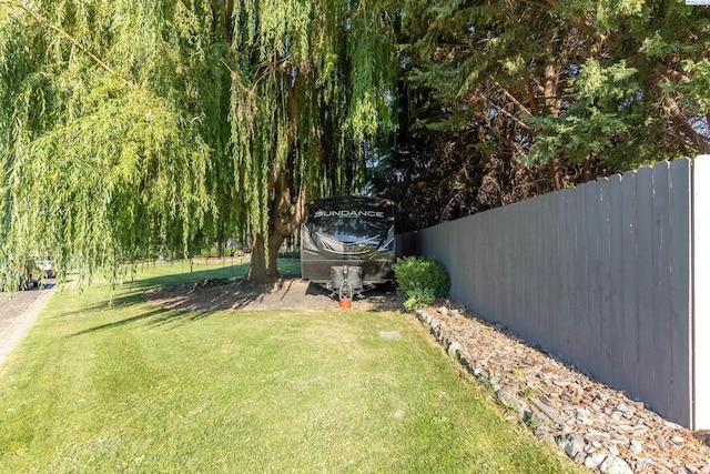 view of yard with fence