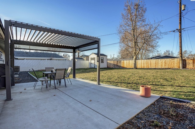 view of patio featuring a pergola and an outbuilding