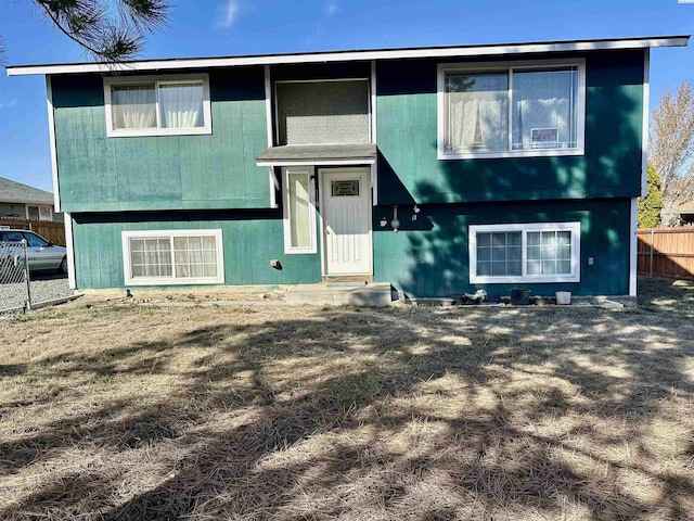 bi-level home with fence