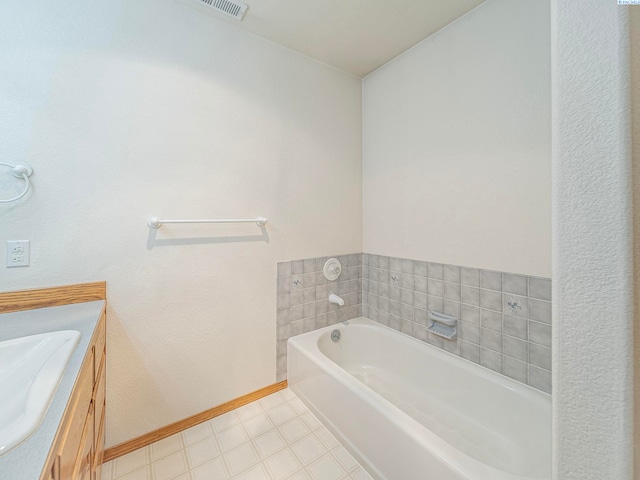 9203 Yakima Ct, Yakima, WA 98908 - full bath featuring a bath, vanity, baseboards, and tile patterned floors