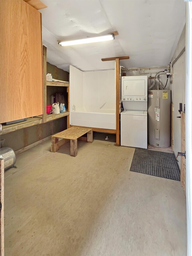 19624 Webber Canyon Rd, Benton City, WA 99320 - basement with stacked washer / dryer and water heater