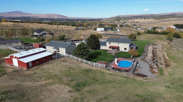 bird's eye view with a rural view and a mountain view