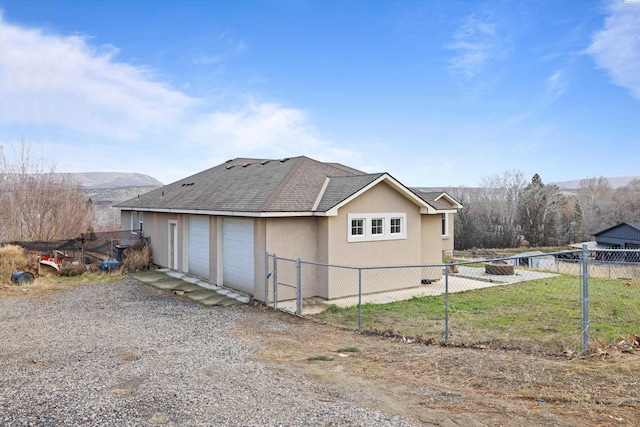 view of home's exterior featuring a mountain view