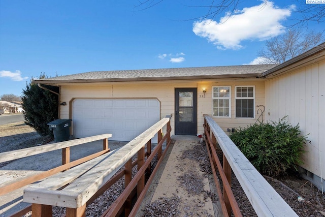 exterior space with a garage