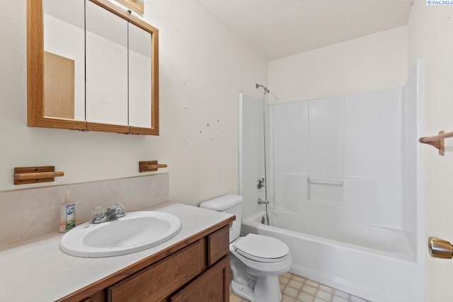 full bathroom featuring vanity, toilet, and bathing tub / shower combination