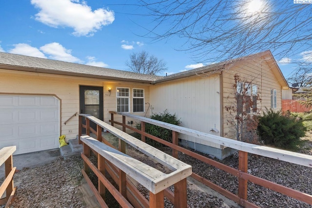 ranch-style house featuring a garage