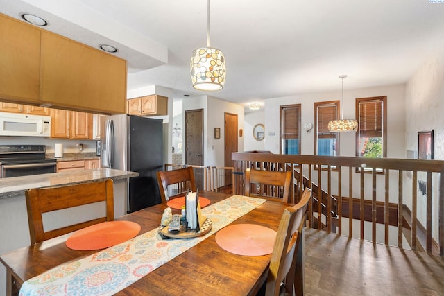 5500 W 26th Ave, Kennewick, WA 99338 - dining space featuring wood finished floors