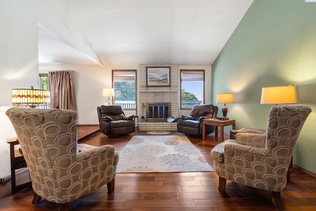 5500 W 26th Ave, Kennewick, WA 99338 - living room with lofted ceiling, wood finished floors, and a fireplace