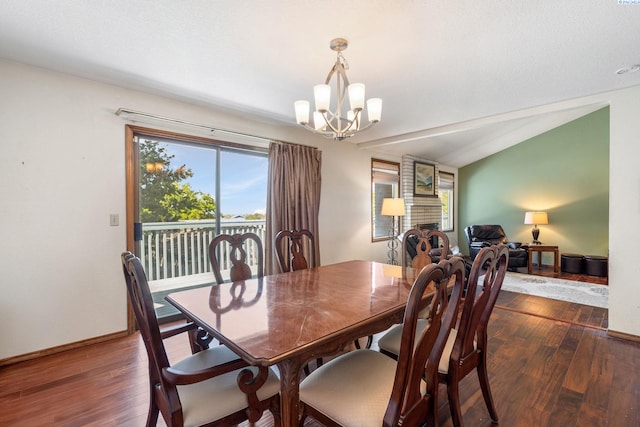 5500 W 26th Ave, Kennewick, WA 99338 - dining space featuring a chandelier, wood finished floors, and lofted ceiling