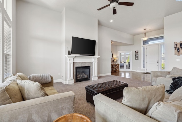 6624 Recurve Rd, Pasco, WA 99301 - living area featuring a ceiling fan, baseboards, a glass covered fireplace, recessed lighting, and carpet floors