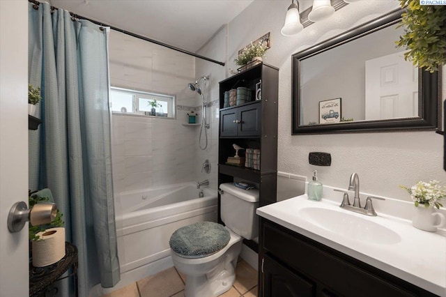736 E 5th Ave, Kennewick, WA 99336 - bathroom featuring shower / bathtub combination with curtain, vanity, tile patterned floors, and a textured wall