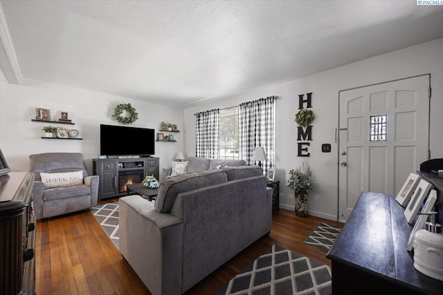 736 E 5th Ave, Kennewick, WA 99336 - living room with dark wood finished floors and a textured ceiling