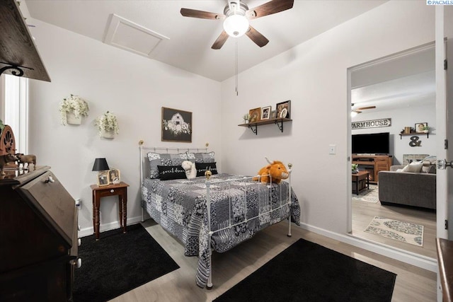 736 E 5th Ave, Kennewick, WA 99336 - bedroom featuring wood finished floors, attic access, and ceiling fan