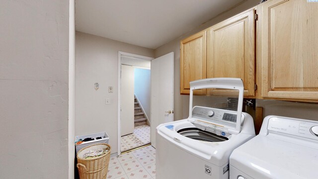 220 E Cannon, Palouse, WA 99161 - laundry room with cabinet space, washer and dryer, and light flooring