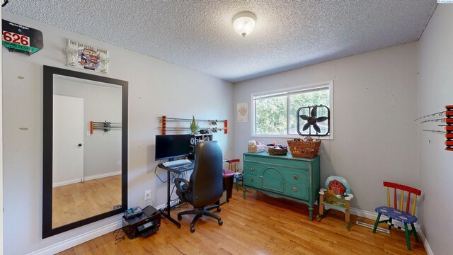 220 E Cannon, Palouse, WA 99161 - home office featuring a textured ceiling and wood finished floors