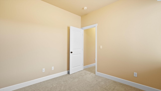 1867 S Fescue St, Kennewick, WA 99338 - empty room with light colored carpet and a smoke detector