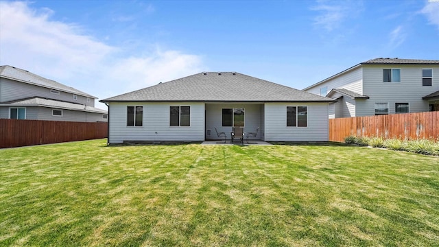 1867 S Fescue St, Kennewick, WA 99338 - rear view of property with a fenced backyard and a patio