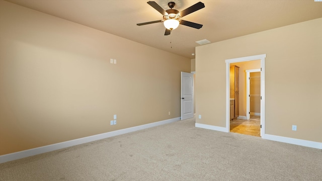 1867 S Fescue St, Kennewick, WA 99338 - unfurnished bedroom featuring light colored carpet, a spacious closet, and ceiling fan