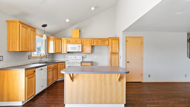5704 Taft Dr, Pasco, WA 99301 - kitchen with white appliances, dark wood-type flooring, high vaulted ceiling, pendant lighting, and a center island