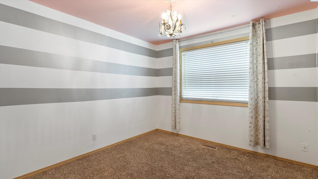 5704 Taft Dr, Pasco, WA 99301 - unfurnished room with carpet and a chandelier