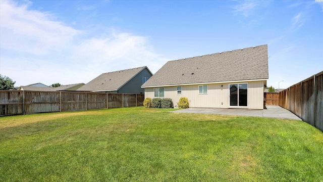 5704 Taft Dr, Pasco, WA 99301 - rear view of property featuring a patio, a fenced backyard, and roof with shingles