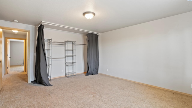 5704 Taft Dr, Pasco, WA 99301 - unfurnished bedroom with light colored carpet and baseboards
