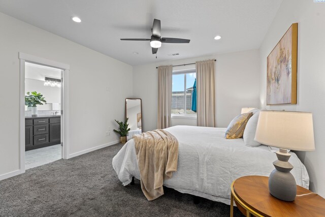 carpeted bedroom featuring ensuite bath, recessed lighting, visible vents, and baseboards